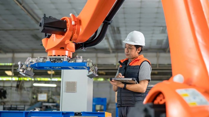 A worker is working in factory