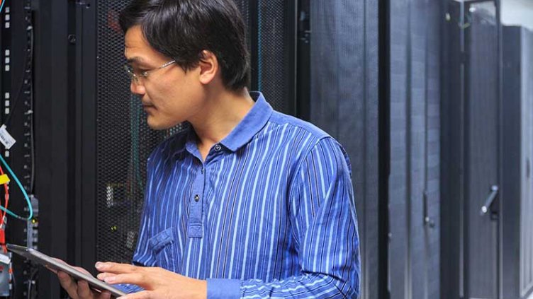 Man working in a server room