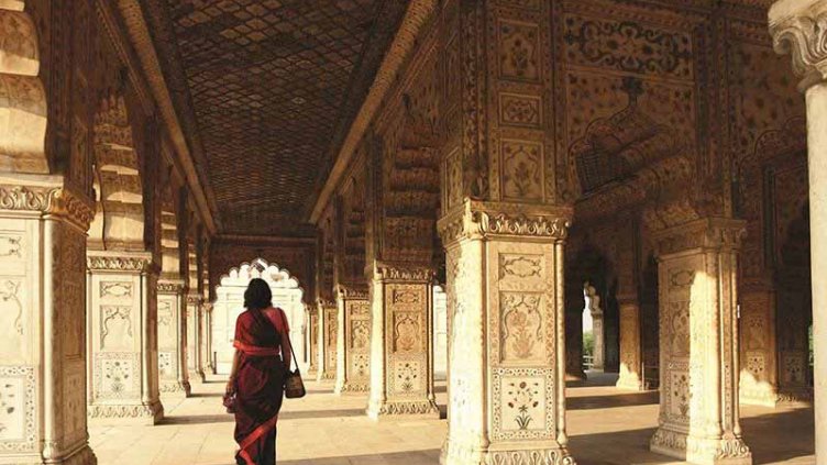 Interior view of Red Fort while woman walking in the Fort Delhi