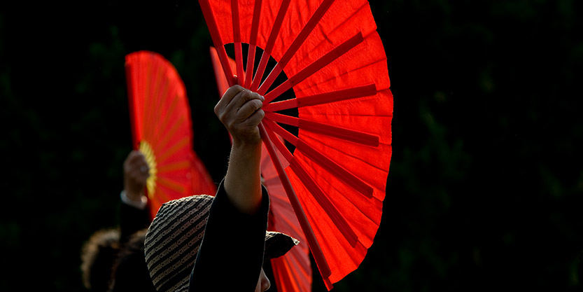 women with hand fan