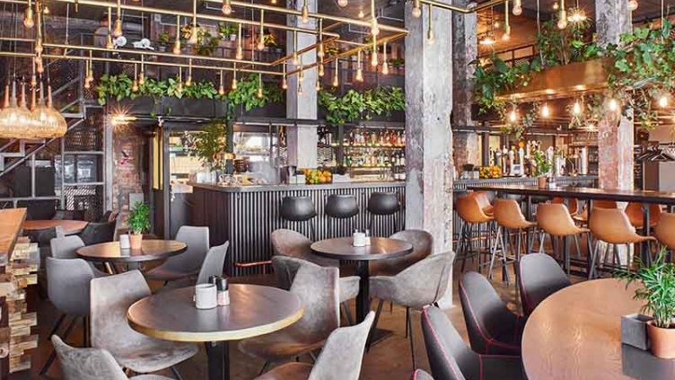 Rustic looking café with greenary