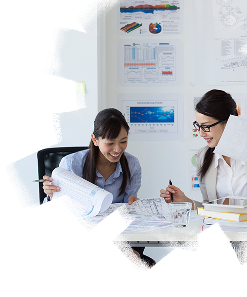 Businesswomen engaging in a productive brainstorming session, discussing ideas and strategies in a collaborative office workspace