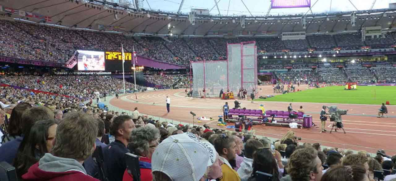 People enjoying olympic games in the stadium