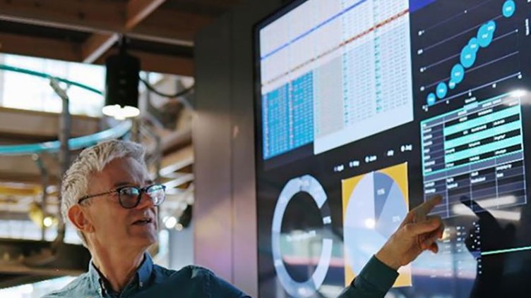 A man explaining something using screen