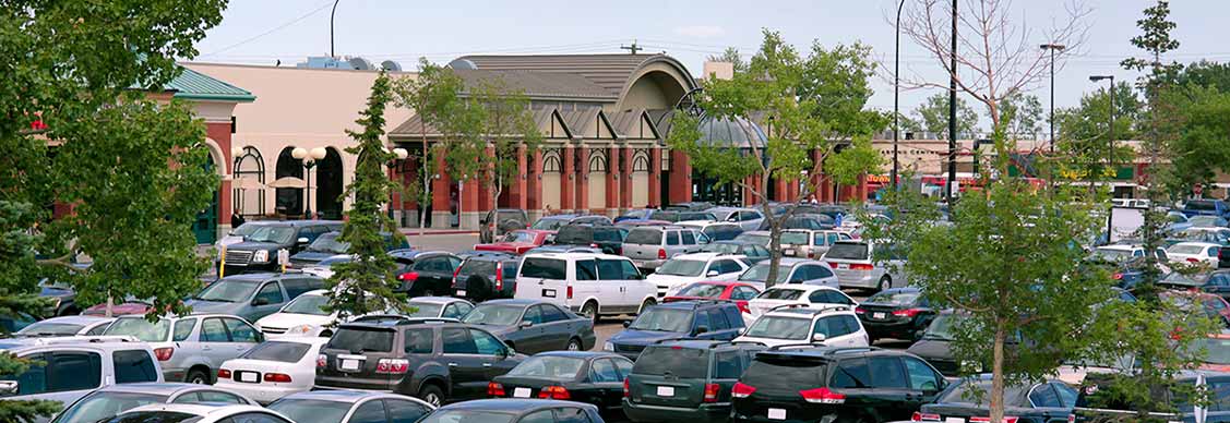 Cars parked in front of mall
