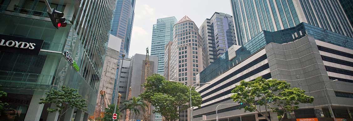 People in front of buildings