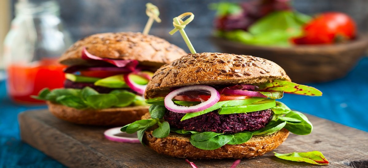 Veggie beet and quinoa burger with avocado; Shutterstock ID 267497981; Departmental Cost Code : Not Synced SSTK Images; Project Code : Not Synced SSTK Images; PO Number: Not Synced SSTK Images