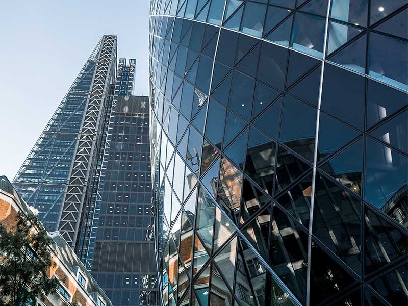 Upward view of glass buildings