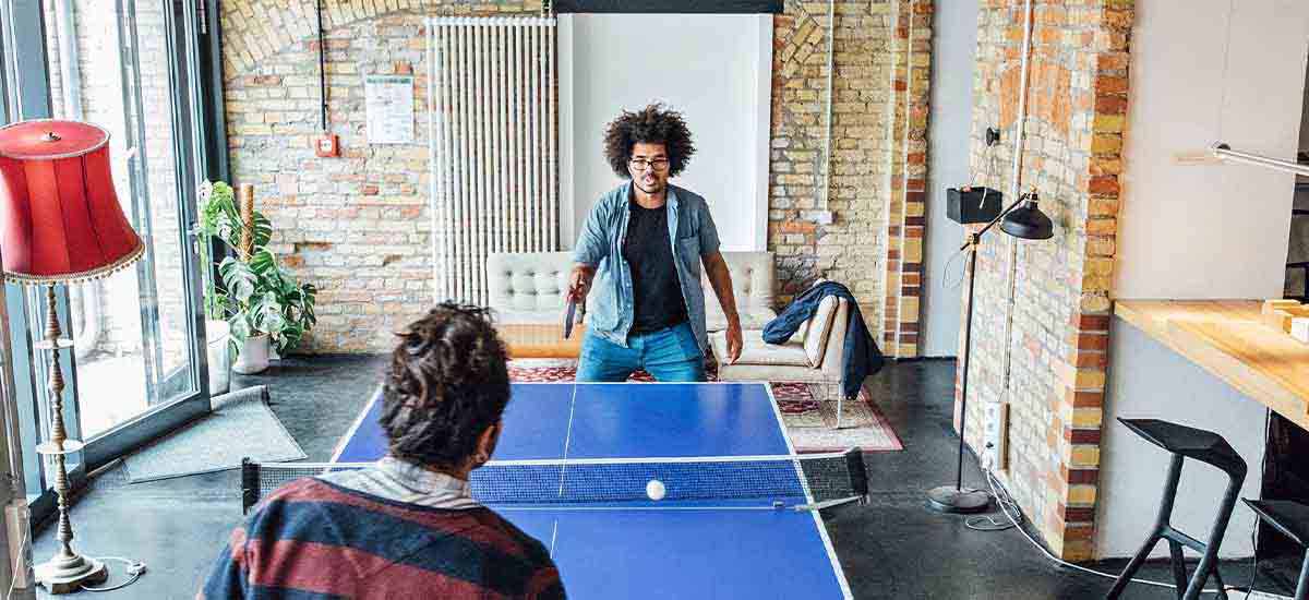 businessmen playing  table tennis