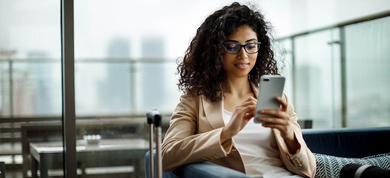 young business woman using mobile phone