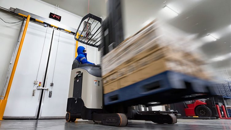 a man  safely taking the covid-19 vaccine from logistic centre